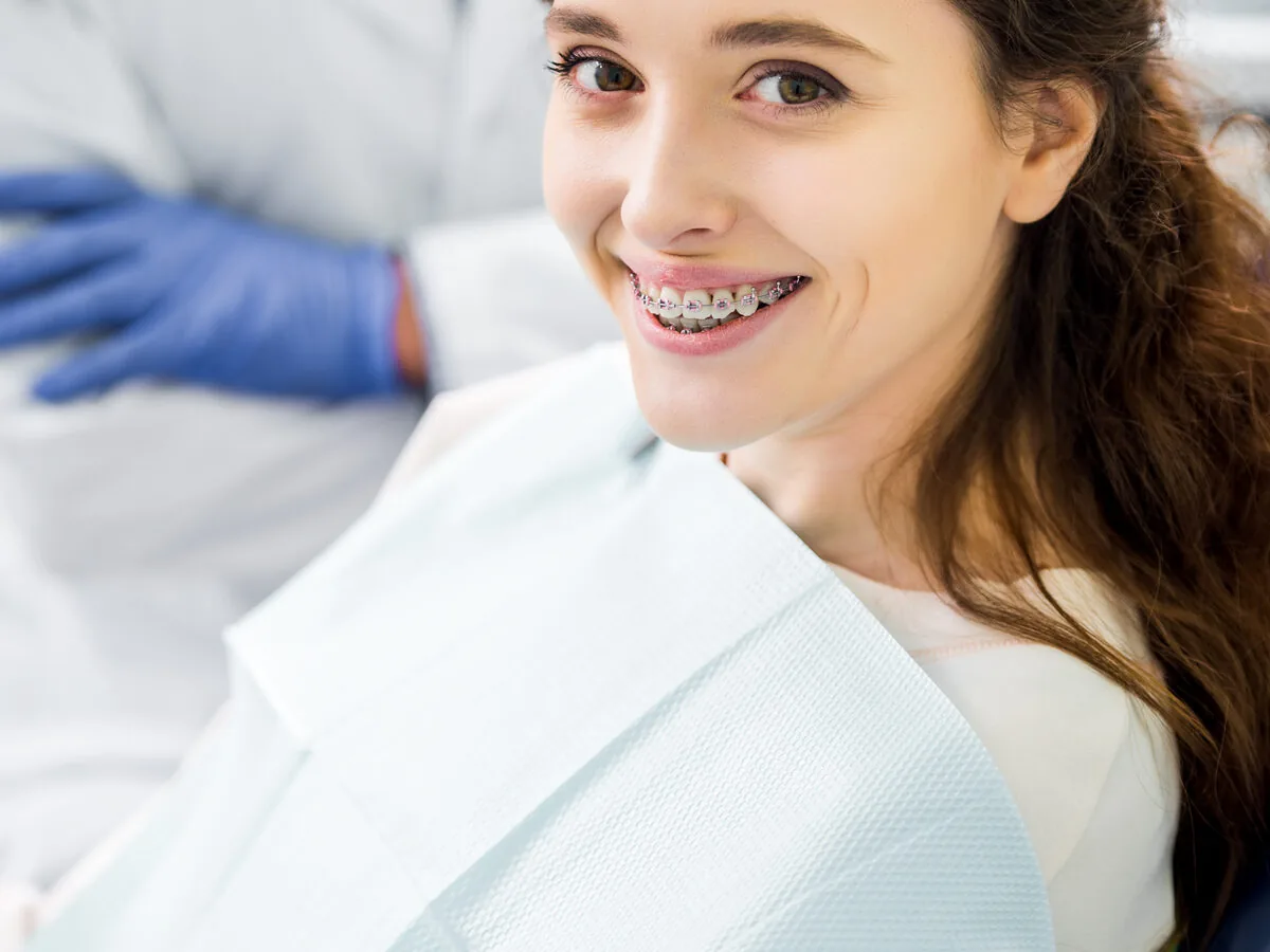 Patient in a dental chair before implant treatment — implant and full-arch dental marketing